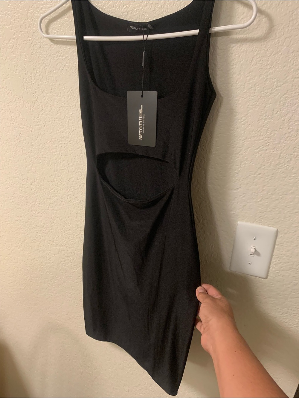 PrettyLittleThing Black Asymmetrical Cutout Mini Dress